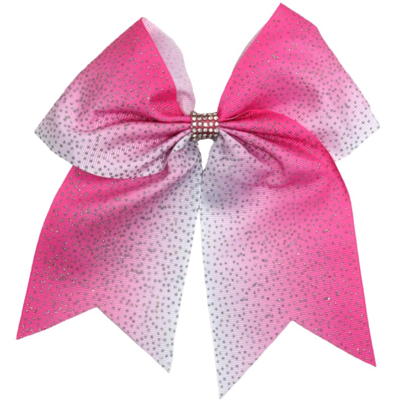 May include: A large pink and white ombre cheer bow with silver glitter. The bow has a rhinestone center.