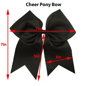 May include: A black Cheer Pony Bow, 7 inches in height and width, with a 5-inch tail and a 3-inch width. The bow is made of a ribbed fabric and features the text "Cheer Pony Bow" at the top.