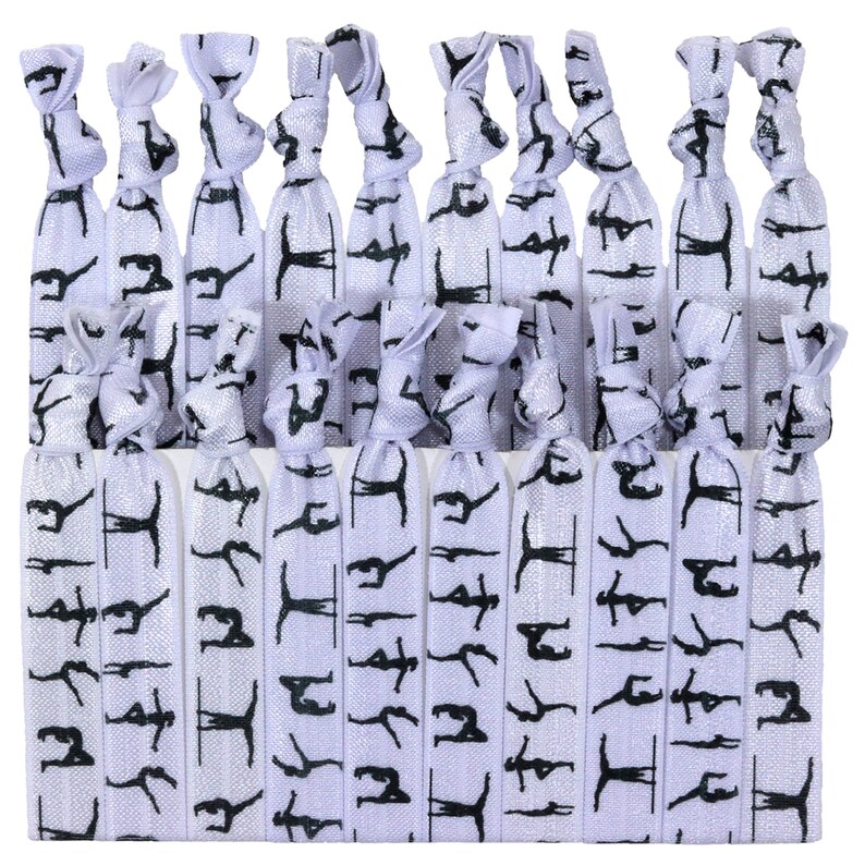 May include: A set of 24 purple and silver hair ties with a black silhouette of a gymnast on a bar repeated on each tie.
