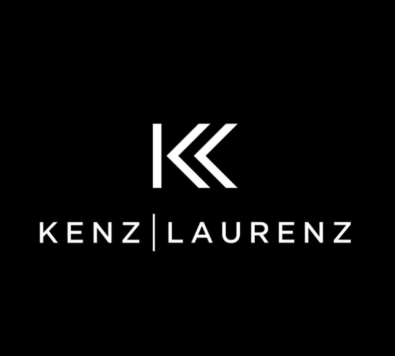 May include: A white logo with the letters "KK" in a stylized font, with the "K" on the left being a single vertical line and the "K" on the right being three overlapping lines. The text "KENZ|LAURENZ" is below the logo.