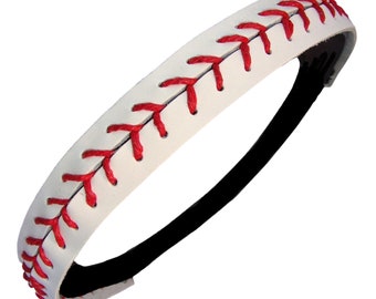 May include: White headband with red stitching, resembling a baseball. The headband is made of faux leather and has a black elastic band.
