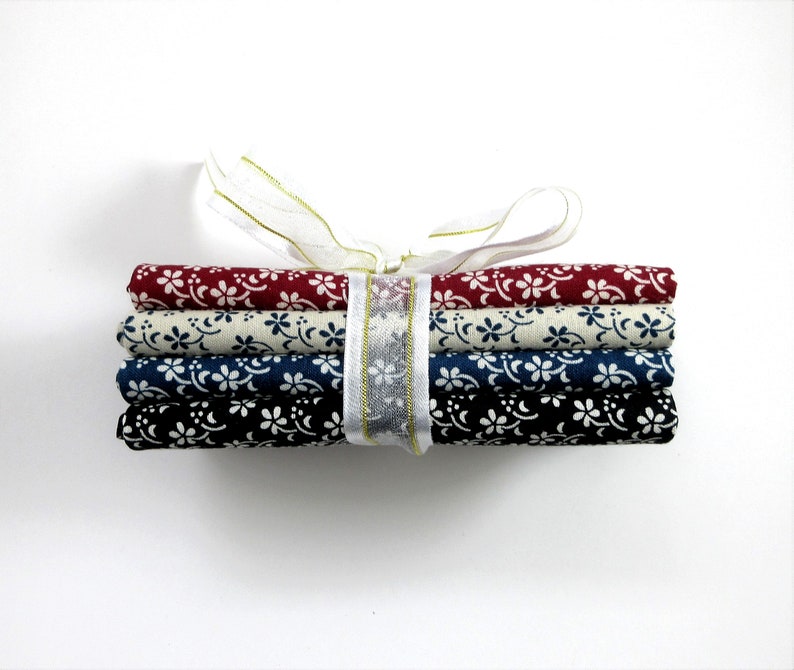 4 Fat Quarters Bundle, Red, Cream, Blue, and Black with Floral Accents image 2