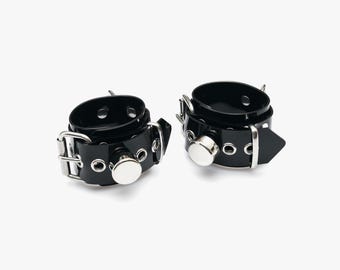 Mankiety na nadgarstki z oczkami ze stali nierdzewnej i zamkiem Segifix