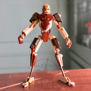 Handcrafted Wooden Toy | Wooden Action Figure with Porcelain Head and Magnetic Forearm | Cyborg Action Figure by Heretic Toy Co.