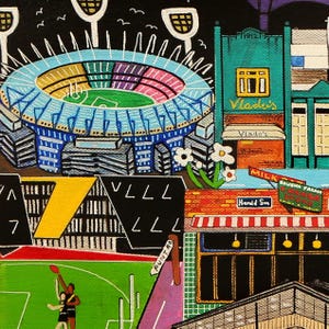 May include: A colorful painting depicting a stadium with bright lights, a green field with two figures playing, and surrounding buildings. Text includes Vlado's, Milk Bar, Corner Store, Herald St, and Punt Rd. The scene features a brick building.