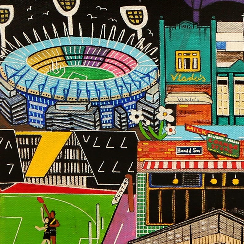 May include: A colorful painting depicting a stadium with bright lights, a green field with two figures playing, and surrounding buildings. Text includes Vlado's, Milk Bar, Corner Store, Herald St, and Punt Rd. The scene features a brick building.