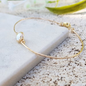 14K Gold Filled Bracelet,White Opal Bracelet,Tiny Opal Bracelet,Simple Dainty Gold Bracelet,Minimalist Gold Bracelet,Cuff Bracelet,Delicate image 3