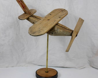ancien avion en bois girouette de toit wabi-sabi
