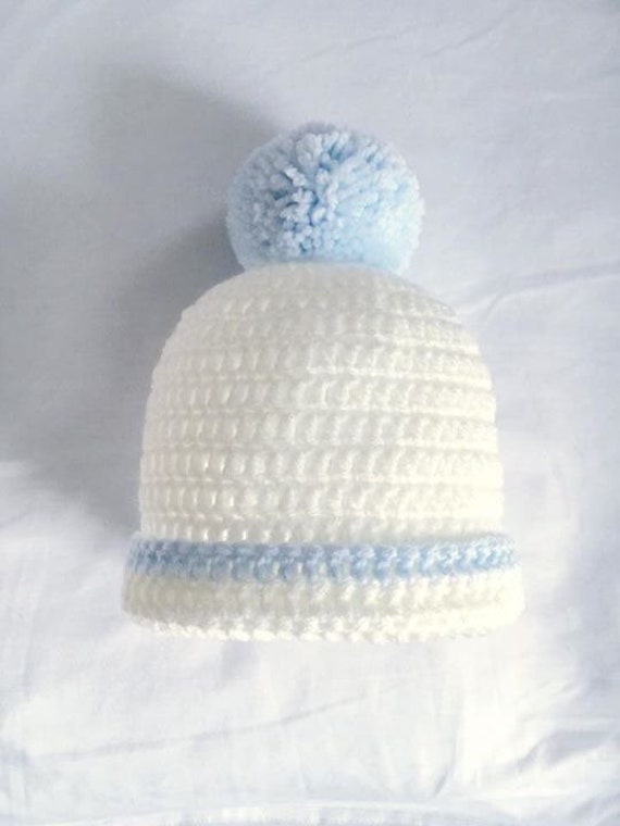 white pom pom hat baby