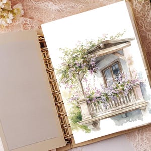 May include: Watercolour painting of a balcony with purple flowers. The balcony has a wooden roof and railing. The painting is on a white page, next to a beige notebook with a gold spiral binding.