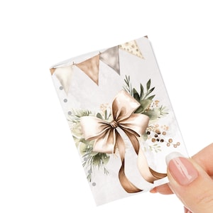 May include: A white background with a watercolour illustration of a brown bow with green leaves and brown flags. The bow is tied with a brown ribbon.