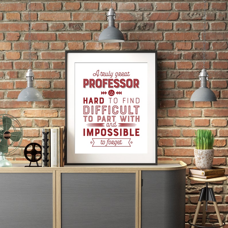May include: A framed print with a red and white quote about a professor. The quote reads "A truly great professor is hard to find, difficult to part with, and impossible to forget."