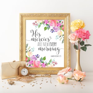 May include: A framed print with a floral design and the text "His mercies are new every morning" with the scripture reference "Lamentations 3:23".