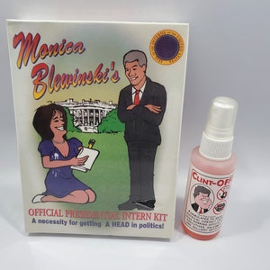 May include: A cartoon illustration of a woman and a man in front of the White House. The woman is holding a notepad and a pen. The man is wearing a suit and tie. The text on the box reads "Monica Blewinski's Official Presidential Intern Kit. A necessity for getting A HEAD in politics!" A small pink bottle with a white spray top reads "Clint-Off".