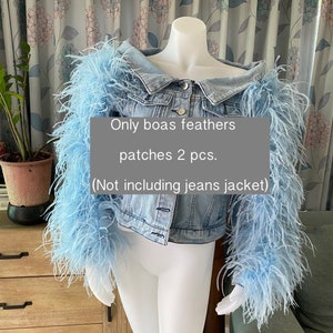 May include: Two light blue feather boas, each with a long, fluffy texture. The boas are attached to the sleeves of a denim jacket. The text on the image reads: "Only boas feathers patches 2 pcs. (Not including jeans jacket)"