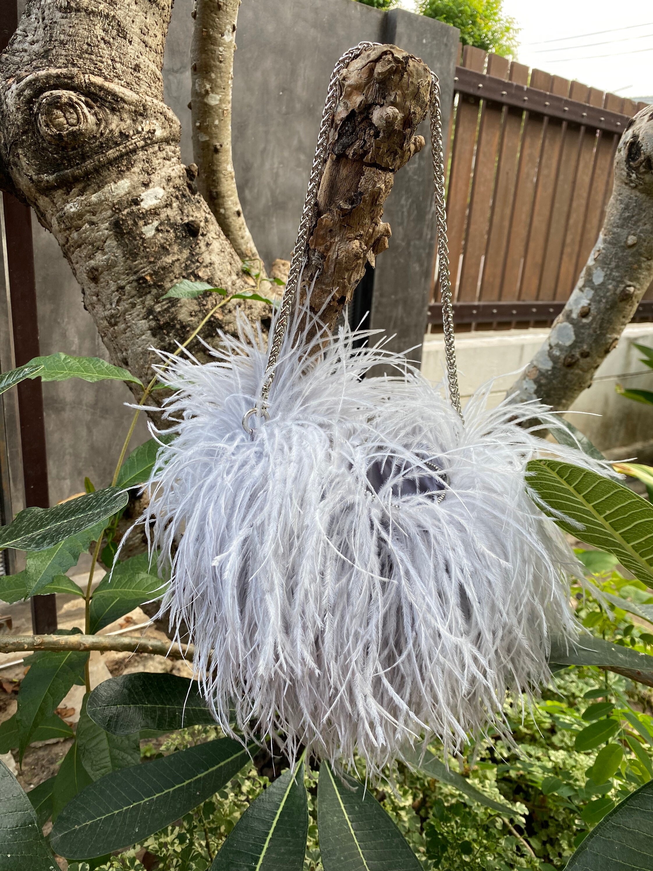 Grey feather clutch bag deals