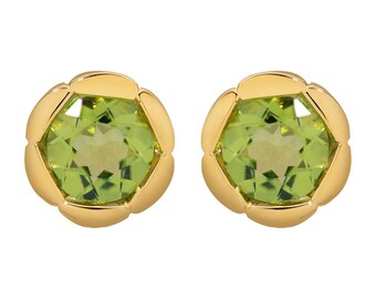 May include: A pair of gold earrings with green gemstone accents. The earrings have a round shape and a textured design.