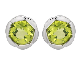 May include: A pair of silver earrings with green gemstone accents. The earrings are round and have a textured design.