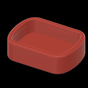 May include: A red plastic container with a rectangular shape and rounded edges. The container is empty and has a smooth surface.