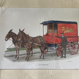 May include: A vintage illustration of a red delivery wagon pulled by two brown mules. The wagon has the text "The Kroger Grocery & Baking Co." on the side. The illustration is titled "In The Beginning".