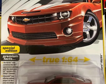 Auto World 2014 Chevy Camaro ZL1 Convertible and 1995 Pontiac