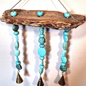 Windchime - Chunky turquoise beads topped with bark. Cone tin bells.