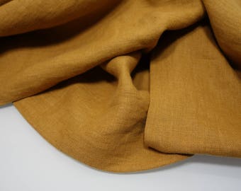Tela de lino puro suavizado, color mostaza, prelavada de gramaje medio, 190 g/m². Tela de lino por metros, cortada a medida.