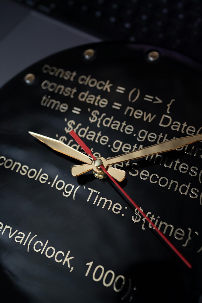Tech-inspired resin clock showcasing JavaScript code for frontend developers