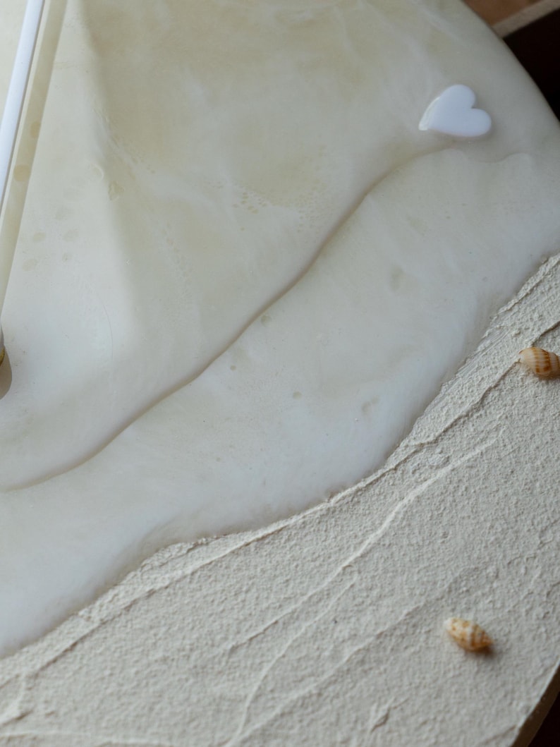 Beige ocean-themed clock with acrylic hands and a soothing seaside design