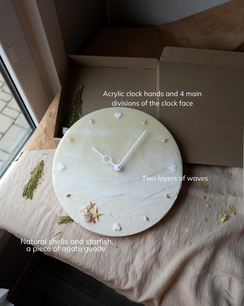 A 30 cm resin clock with coastal details, including agate geode and minimalist markers