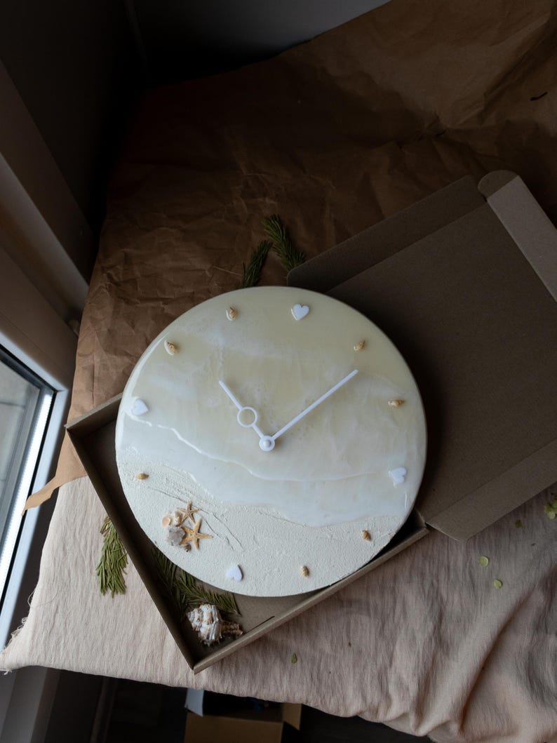Handcrafted resin clock with a nautical vibe, perfect for aesthetic home decor.