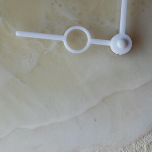 White acrylic hands, Modern resin clock showcasing layered waves and natural sea elements