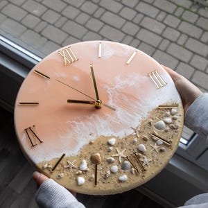 Resin Ocean Clock: Peach Coastal Wall Art with Natural Shells and Starfish