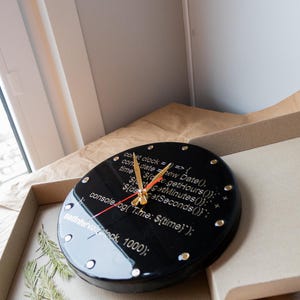 A hacker-themed clock with a minimalist design, ideal for a modern workspace