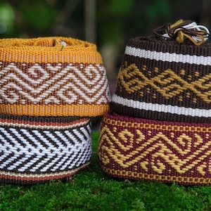 Tšombiach or &quot;chumbe&quot;, traditional handmade embroiderd belt, womb sash made by Kamentsà natives from Colombia representings sacred symbology
