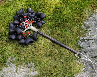 OJO DE BUEY rattle.Shamanic rattle made out of jungle seeds from Amazon forest .