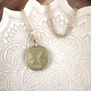 Filippijnse vlindermunthangerketting, gouden sieraden