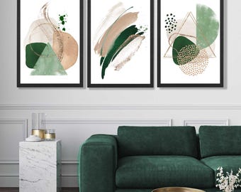 May include: Three framed abstract art prints with a green, brown, and gold color scheme. The prints feature geometric shapes and brushstrokes.
