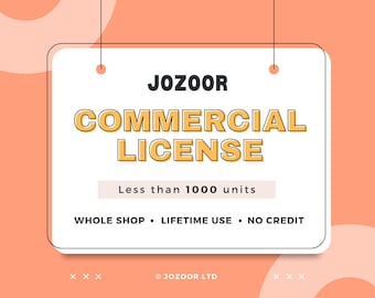 May include: A white sign with black text and a yellow outline reads "JOZOOR COMMERCIAL LICENSE" and "Less than 1000 units". Below the text is "WHOLE SHOP • LIFETIME USE • NO CREDIT". The sign is hanging from two strings.