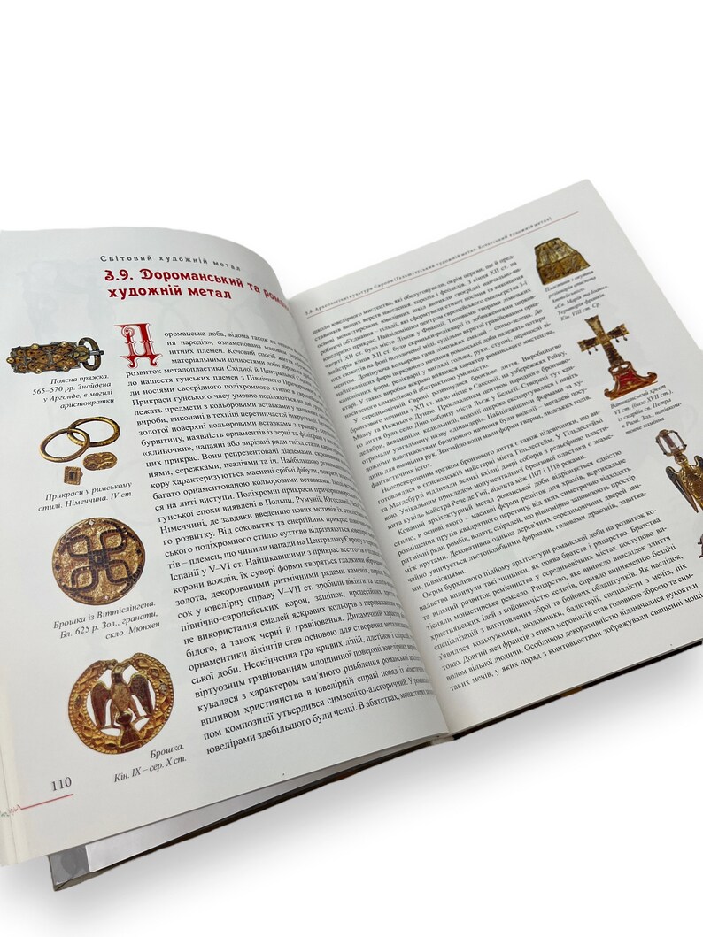 May include: A page from a book about pre-Romanesque and Romanesque art. The page features images of jewelry, brooches, and other metalwork. The text discusses the development of metalwork during this period.
