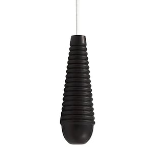May include: A dark brown light pull with a ridged design, shaped like a teardrop. It hangs from a white cord against a white backdrop. The pull is made of a solid material and has a smooth, rounded base.