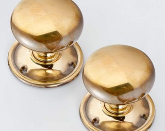 Very Large Aged Brass Cottage Rim Door Knobs Pair