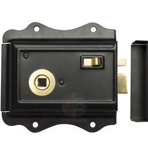 May include: Black door lock with brass detailing. The lock is rectangular with curved edges and a square keyhole. The strike plate is separate. This lock is designed for security and is likely for a front door.