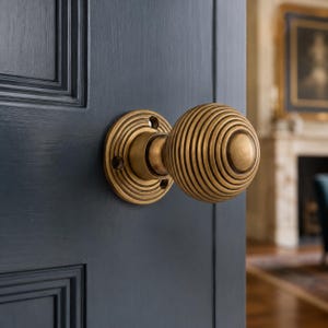Antique Brass Hollow Beehive Door Knob Pair
