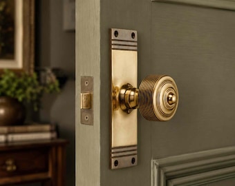 Aged Brass Reeded Door Knobs On Backplate