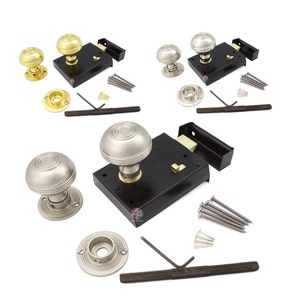 May include: A selection of door hardware, featuring brass and nickel doorknobs, black door latches, mounting plates, screws, and an Allen key. The doorknobs have a round, ribbed design. The hardware is presented against a white backdrop.