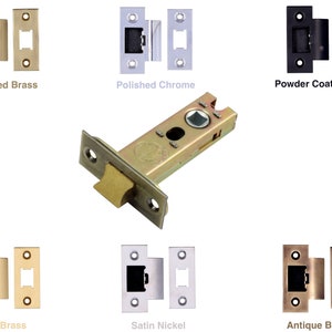 May include: A range of door latches in different finishes: polished brass, polished chrome, powder-coated black, satin brass, satin nickel, and antique brass. The central latch is shown in detail, highlighting its mechanical design.