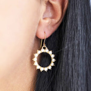 Gold sunburst pearl earrings image 1