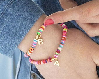 Personalised multicoloured disc stretch bracelet with gold initial charm