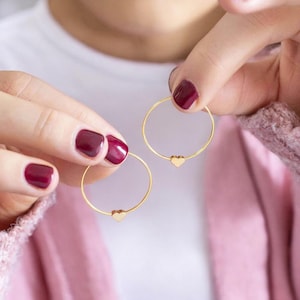 Tiny gold heart hoop earrings